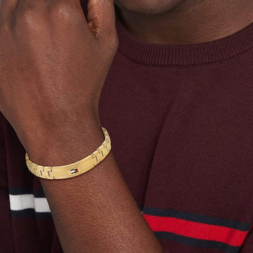 Ανδρικό βραχιόλι ατσάλινο Tommy Hilfiger TH2790421 σε χρυσό χρώμα.